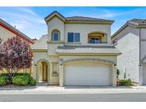 Charming two-story home with a well-maintained lawn and an attached two-car garage at 9225 Dalmahoy Pl, Las Vegas, NV 89145