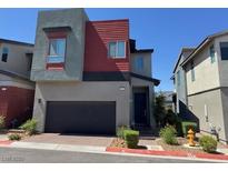 Modern two-story home with attached garage and contemporary design elements at 3194 Lumassina Way, Henderson, NV 89044