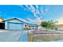 Charming single-story home features a well-maintained front yard and attached two-car garage at 5368 Regal Ave, Las Vegas, NV 89146