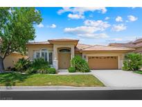 Charming single-story home featuring a well-manicured lawn and attached two-car garage at 2113 Scarlet Rose Dr, Las Vegas, NV 89134