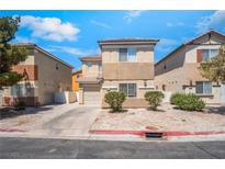 Inviting two-story home featuring desert landscaping and an attached garage in a suburban setting at 2149 Clancy St, Las Vegas, NV 89156