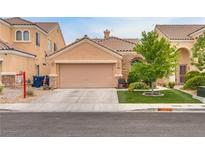Inviting single-Gathering home features desert landscaping and a spacious two-car garage at 6916 Gothic Marigold St, Las Vegas, NV 89149