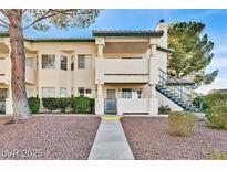 Charming condo featuring well-maintained landscaping and inviting facade at 901 Sulphur Springs Ln # 101, Las Vegas, NV 89128