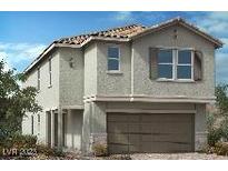 Charming two-story home featuring a tile roof, neutral stucco and a welcoming two-car garage at 9564 Hinson St, Las Vegas, NV 89102