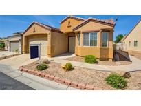Charming single-story home showcasing xeriscaping, desert landscaping, and an inviting front entrance at 3429 Glacial Lake St, Las Vegas, NV 89122