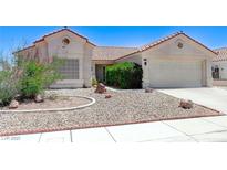 Charming single-story home with desert landscaping and a two-car garage at 4724 Victoria Beach Way, Las Vegas, NV 89130