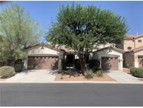 Charming single-story home with two-car garage and mature landscaping at 3328 White Bark Pine St, Las Vegas, NV 89129