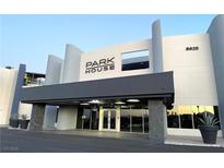 Contemporary Park House exterior with modern design, planters, and covered entrance at street level at 8925 W Flamingo Rd # 319, Las Vegas, NV 89147