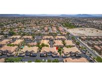 Expansive aerial view of townhomes with well-maintained landscaping and neighborhood amenities at 5855 Valley Dr # 2106, North Las Vegas, NV 89031