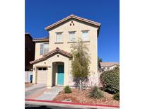 Charming two story home with a cute yard and a detached one car garage at 10331 Ednor St, Las Vegas, NV 89183
