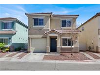 Charming two-story home with a well-maintained yard and inviting entrance, perfect for a Gathering at 5200 Paradise Skies Ave, Las Vegas, NV 89156