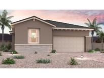 Single-story home with desert landscaping, two-car garage, and neutral color palette offers modern curb appeal at 8432 Vanhoy Creek St, Las Vegas, NV 89166