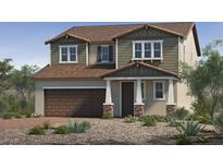 Charming two-story home with a two-car garage and low maintenance front yard at 3697 Alla Rocca Ave, Henderson, NV 89044