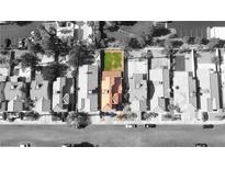 Stunning aerial view of a home showcasing its layout, landscaping, and neighborhood surroundings at 7329 Restful Springs Ct, Las Vegas, NV 89128