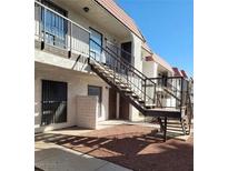 Two-story townhouse with private entrance, accessible by outdoor staircase at 4300 N Lamont St # 232, Las Vegas, NV 89115
