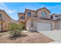 Charming two-story home featuring a tile roof and a spacious two-car garage at 3359 Commendation Dr, Las Vegas, NV 89117