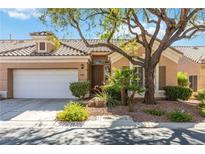 Charming single-story home featuring a two-car garage and desert landscaping at 4760 Verdet St, Las Vegas, NV 89147