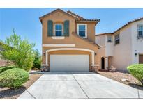 Charming two-story home with a two-car garage, desert landscaping, and striking curb appeal at 3757 Via Geneva, Henderson, NV 89052