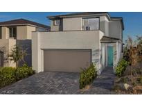 Charming two-story home featuring a modern design, attached garage, and well-maintained front yard at 1556 Pacific Baza St, Las Vegas, NV 89138