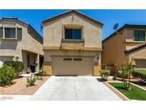 Charming two-story home featuring a two-car garage and low maintenance landscaping at 6548 Butterfly Sky St, North Las Vegas, NV 89084