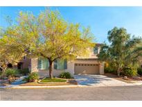Charming two-story home featuring a well-manicured front yard and a two-car garage at 7057 Fort Union Ct, Las Vegas, NV 89179