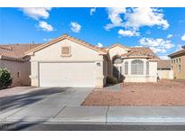 Charming single-story home featuring a two-car garage, well-kept landscape, and a classic architectural design at 3340 N Campbell Rd, Las Vegas, NV 89129