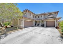 Charming two-story home featuring a spacious driveway and attached two-car garage at 5716 Breckenridge St, North Las Vegas, NV 89081