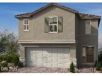 Two-story home with neutral stucco, a two-car garage, and simple, modern window trim at 4205 Zilker Park Ave, North Las Vegas, NV 89081