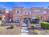 Charming two-story townhome with a well-maintained front yard and inviting entryway at 2120 Waterlily View St, Henderson, NV 89044