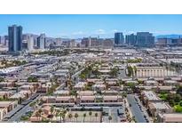 Scenic aerial view of a residential area with the Las Vegas skyline in the background at 4980 Indian River Dr # 447, Las Vegas, NV 89103